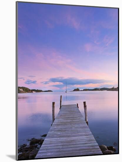 Norway, Oslo, Oslo Fjord, Jetty over Lake at Dusk-Shaun Egan-Mounted Photographic Print