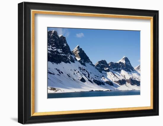 Norway. Svalbard. Hornsund. Dramatic Cliffs Tower over the Sound-Inger Hogstrom-Framed Photographic Print