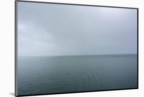 Norway. Svalbard. Hornsund. Heavy Clouds over the Calm Water-Inger Hogstrom-Mounted Photographic Print