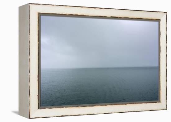 Norway. Svalbard. Hornsund. Heavy Clouds over the Calm Water-Inger Hogstrom-Framed Premier Image Canvas