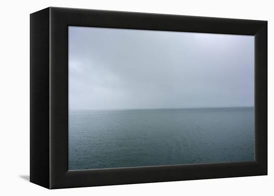 Norway. Svalbard. Hornsund. Heavy Clouds over the Calm Water-Inger Hogstrom-Framed Premier Image Canvas