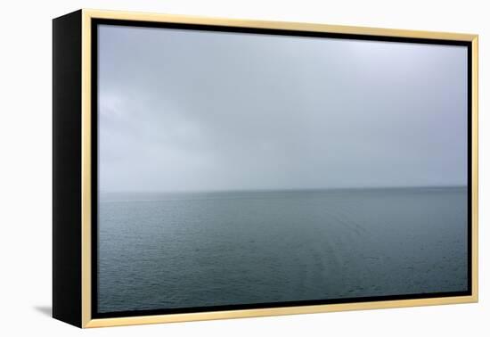 Norway. Svalbard. Hornsund. Heavy Clouds over the Calm Water-Inger Hogstrom-Framed Premier Image Canvas