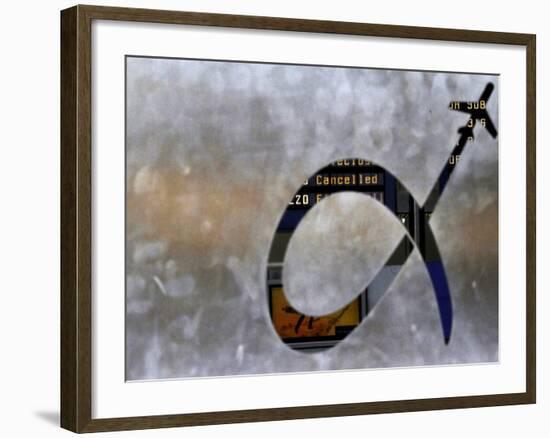 Notice Board is Seen Through Frosted Glass Bearing the Logo of Athens International Airport-null-Framed Photographic Print