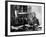 Novelist and Script Writer William Faulkner Smoking a Pipe at His Desk at Warner Brothers Studios-null-Framed Premium Photographic Print