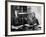 Novelist and Script Writer William Faulkner Smoking a Pipe at His Desk at Warner Brothers Studios-null-Framed Premium Photographic Print