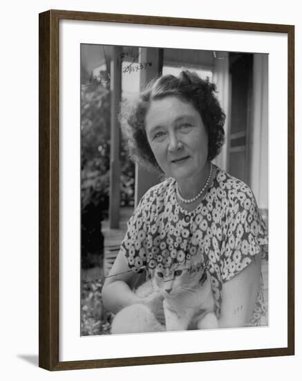 Novelist Marjorie K. Rawlings Holding Her Cat-Nina Leen-Framed Premium Photographic Print