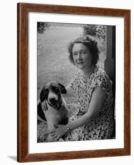 Novelist Marjorie K. Rawlings Petting Her Dog-Nina Leen-Framed Premium Photographic Print