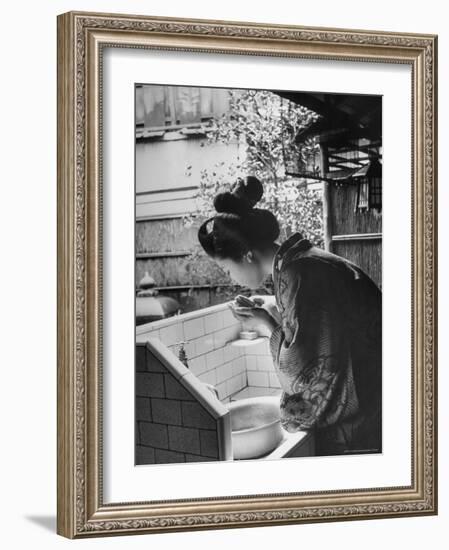 Novice Geisha Washing Her Face at a Basin-Alfred Eisenstaedt-Framed Photographic Print