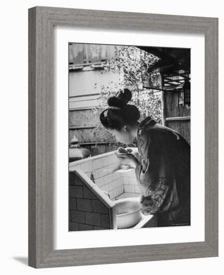 Novice Geisha Washing Her Face at a Basin-Alfred Eisenstaedt-Framed Photographic Print