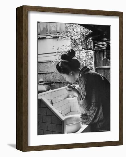 Novice Geisha Washing Her Face at a Basin-Alfred Eisenstaedt-Framed Photographic Print