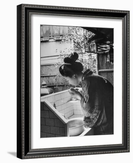 Novice Geisha Washing Her Face at a Basin-Alfred Eisenstaedt-Framed Photographic Print