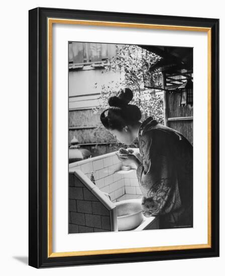 Novice Geisha Washing Her Face at a Basin-Alfred Eisenstaedt-Framed Photographic Print