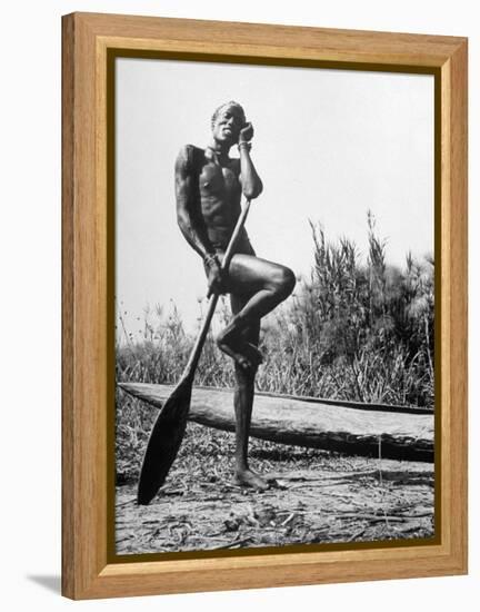 Nuer Tribesman Standing Like a Stork Next to His Canoe in a Papyrus Swamp-Eliot Elisofon-Framed Premier Image Canvas