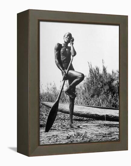 Nuer Tribesman Standing Like a Stork Next to His Canoe in a Papyrus Swamp-Eliot Elisofon-Framed Premier Image Canvas