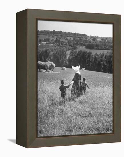 Nun Taking Two Young Children from the Mission on a Walk-null-Framed Premier Image Canvas