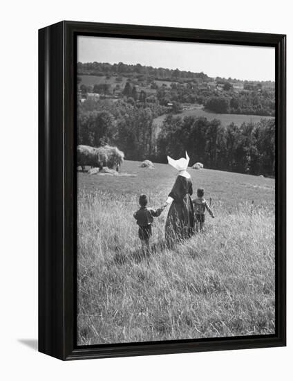 Nun Taking Two Young Children from the Mission on a Walk-null-Framed Premier Image Canvas