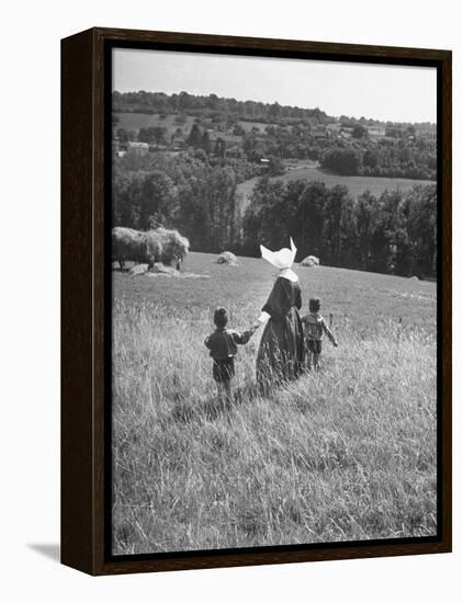 Nun Taking Two Young Children from the Mission on a Walk-null-Framed Premier Image Canvas