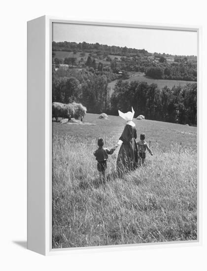 Nun Taking Two Young Children from the Mission on a Walk-null-Framed Premier Image Canvas