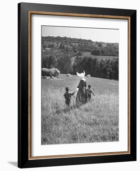 Nun Taking Two Young Children from the Mission on a Walk-null-Framed Photographic Print