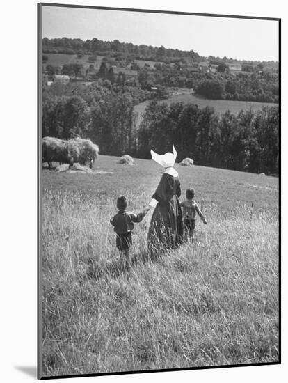 Nun Taking Two Young Children from the Mission on a Walk-null-Mounted Photographic Print