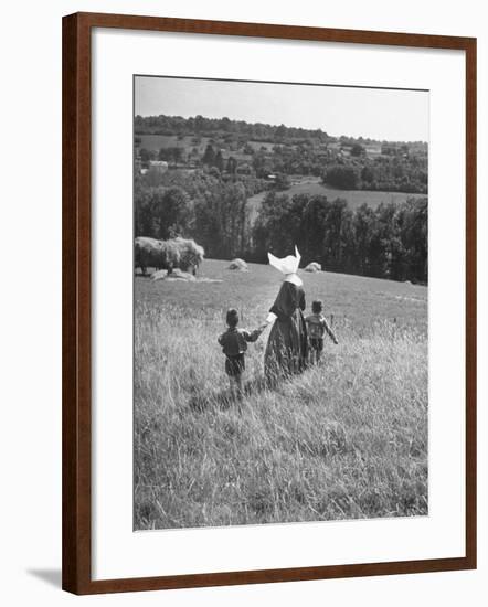 Nun Taking Two Young Children from the Mission on a Walk-null-Framed Photographic Print