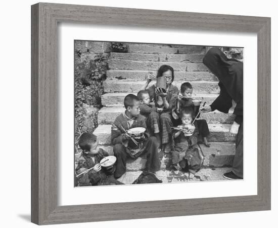 Nuns Administering Care and Food to a Needy Family, During the Famine-null-Framed Photographic Print