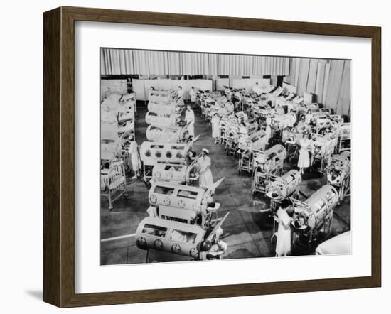 Nurse Attend to a Room Full of Polio Patients in Iron Lung Respirators-null-Framed Photo