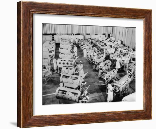 Nurse Attend to a Room Full of Polio Patients in Iron Lung Respirators-null-Framed Photo