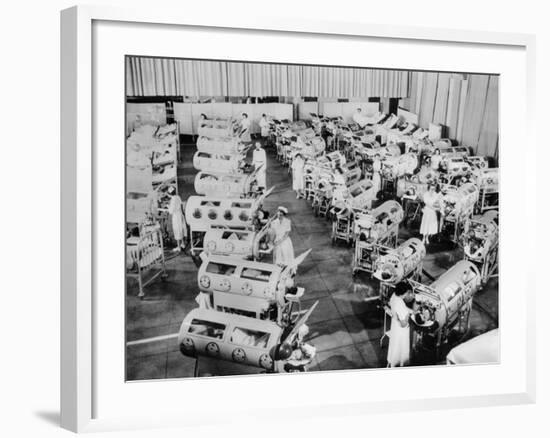 Nurse Attend to a Room Full of Polio Patients in Iron Lung Respirators--Framed Photo