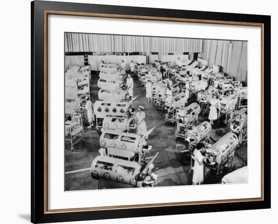 Nurse Attend to a Room Full of Polio Patients in Iron Lung Respirators-null-Framed Photo