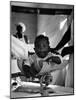 Nurse-Midwife Maude Callen Weighing Baby on Scale-W^ Eugene Smith-Mounted Photographic Print