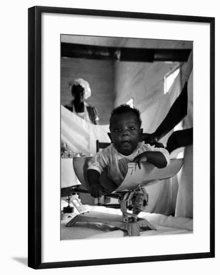 Nurse-Midwife Maude Callen Weighing Baby on Scale-W^ Eugene Smith-Framed Photographic Print