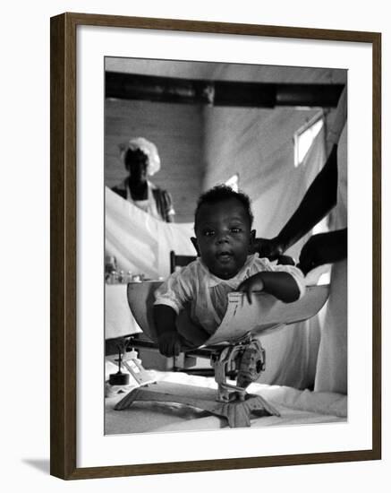 Nurse-Midwife Maude Callen Weighing Baby on Scale-W^ Eugene Smith-Framed Photographic Print