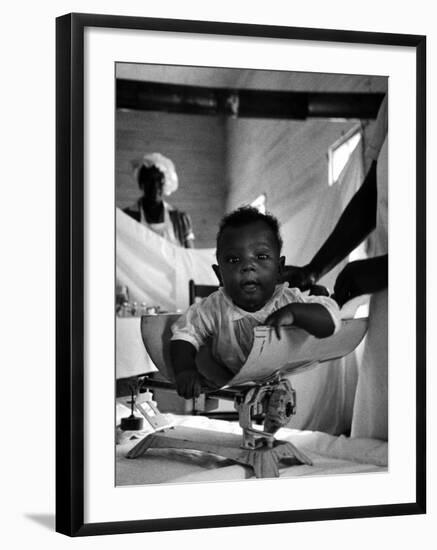 Nurse-Midwife Maude Callen Weighing Baby on Scale-W^ Eugene Smith-Framed Photographic Print