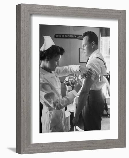 Nurse Taking a Blood from a Patient-Ralph Morse-Framed Photographic Print