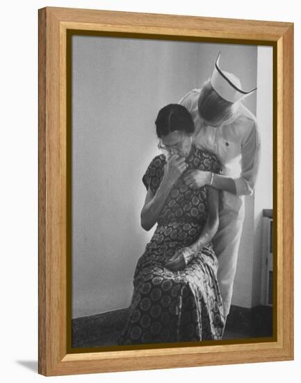 Nurse Trying to Comfort an Elderly Patient-Carl Mydans-Framed Premier Image Canvas