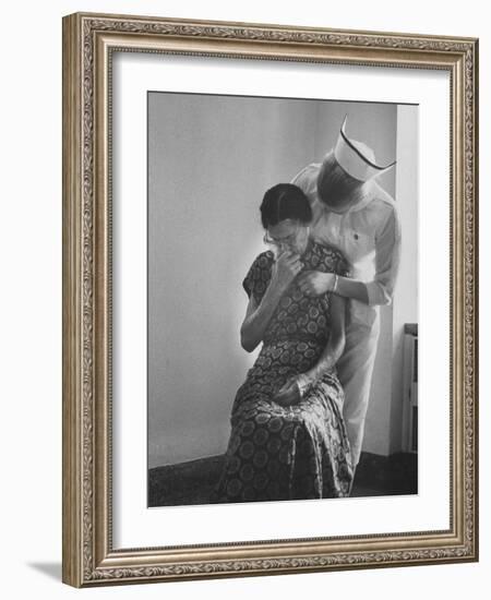 Nurse Trying to Comfort an Elderly Patient-Carl Mydans-Framed Photographic Print