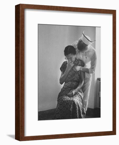 Nurse Trying to Comfort an Elderly Patient-Carl Mydans-Framed Photographic Print