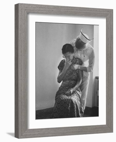 Nurse Trying to Comfort an Elderly Patient-Carl Mydans-Framed Photographic Print