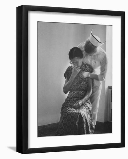 Nurse Trying to Comfort an Elderly Patient-Carl Mydans-Framed Photographic Print