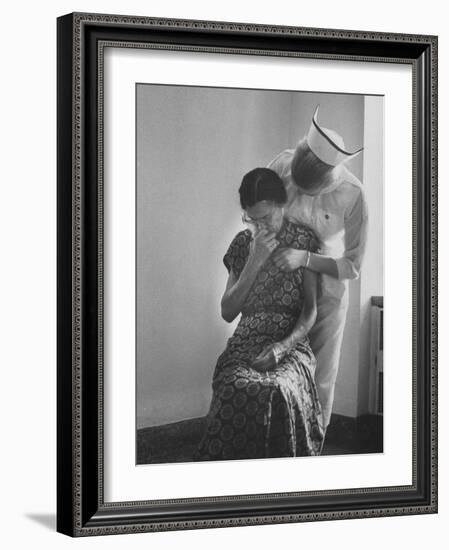 Nurse Trying to Comfort an Elderly Patient-Carl Mydans-Framed Photographic Print