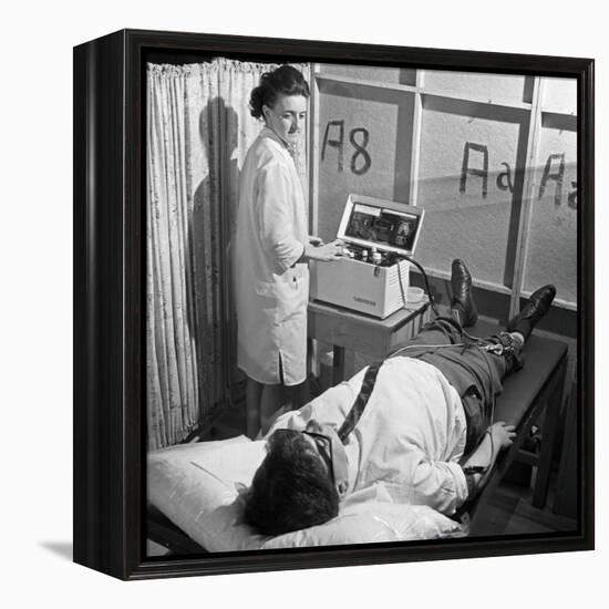 Nurse Using a Cardiopan Machine, Rotherham, South Yorkshire, 1967-Michael Walters-Framed Premier Image Canvas