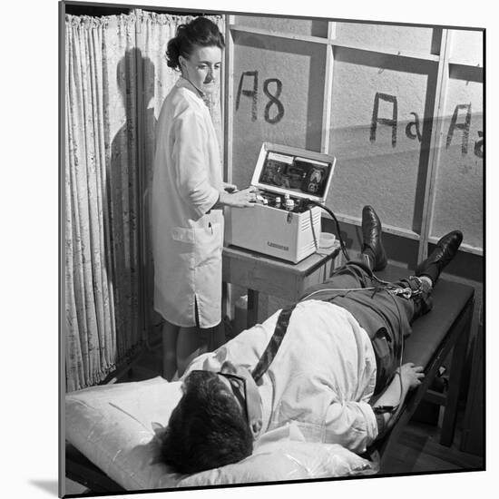 Nurse Using a Cardiopan Machine, Rotherham, South Yorkshire, 1967-Michael Walters-Mounted Photographic Print