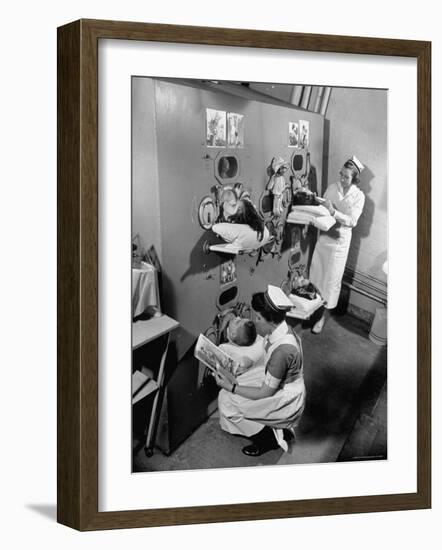 Nurses at Children's Hospital Tending Young Polio Patients Contained in Iron Lung Room-Hansel Mieth-Framed Photographic Print