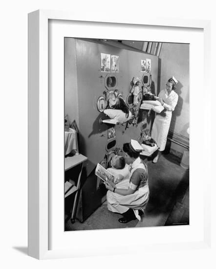 Nurses at Children's Hospital Tending Young Polio Patients Contained in Iron Lung Room-Hansel Mieth-Framed Photographic Print