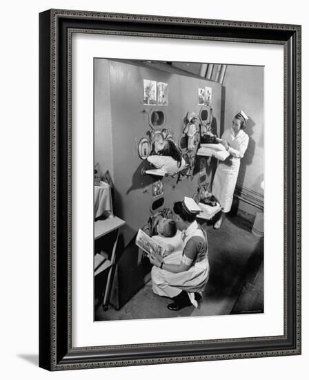 Nurses at Children's Hospital Tending Young Polio Patients Contained in Iron Lung Room-Hansel Mieth-Framed Photographic Print