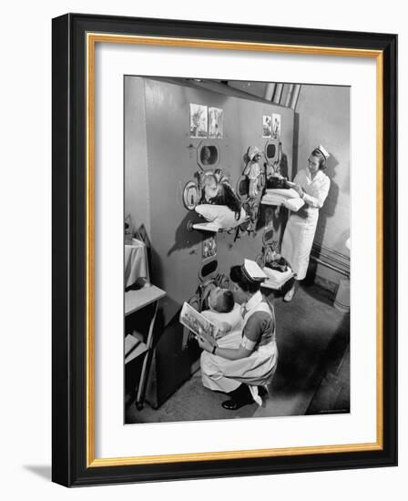 Nurses at Children's Hospital Tending Young Polio Patients Contained in Iron Lung Room-Hansel Mieth-Framed Photographic Print