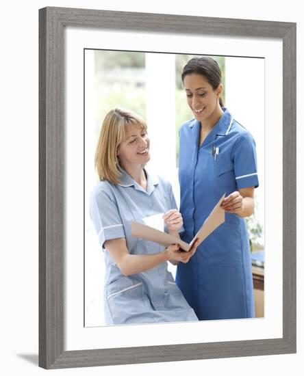 Nurses Checking Notes-Science Photo Library-Framed Photographic Print