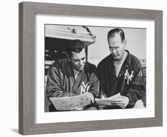 Ny Giants Coaches, Tom Landry and Vince Lombardi Reviewing Play Charts-null-Framed Photo