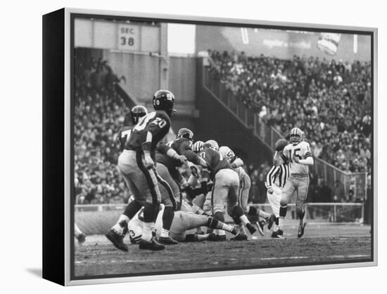 Ny Giants in Dark Jerseys, in a Football Game Against the Green Bay Packers at Yankee Stadium-John Loengard-Framed Premier Image Canvas